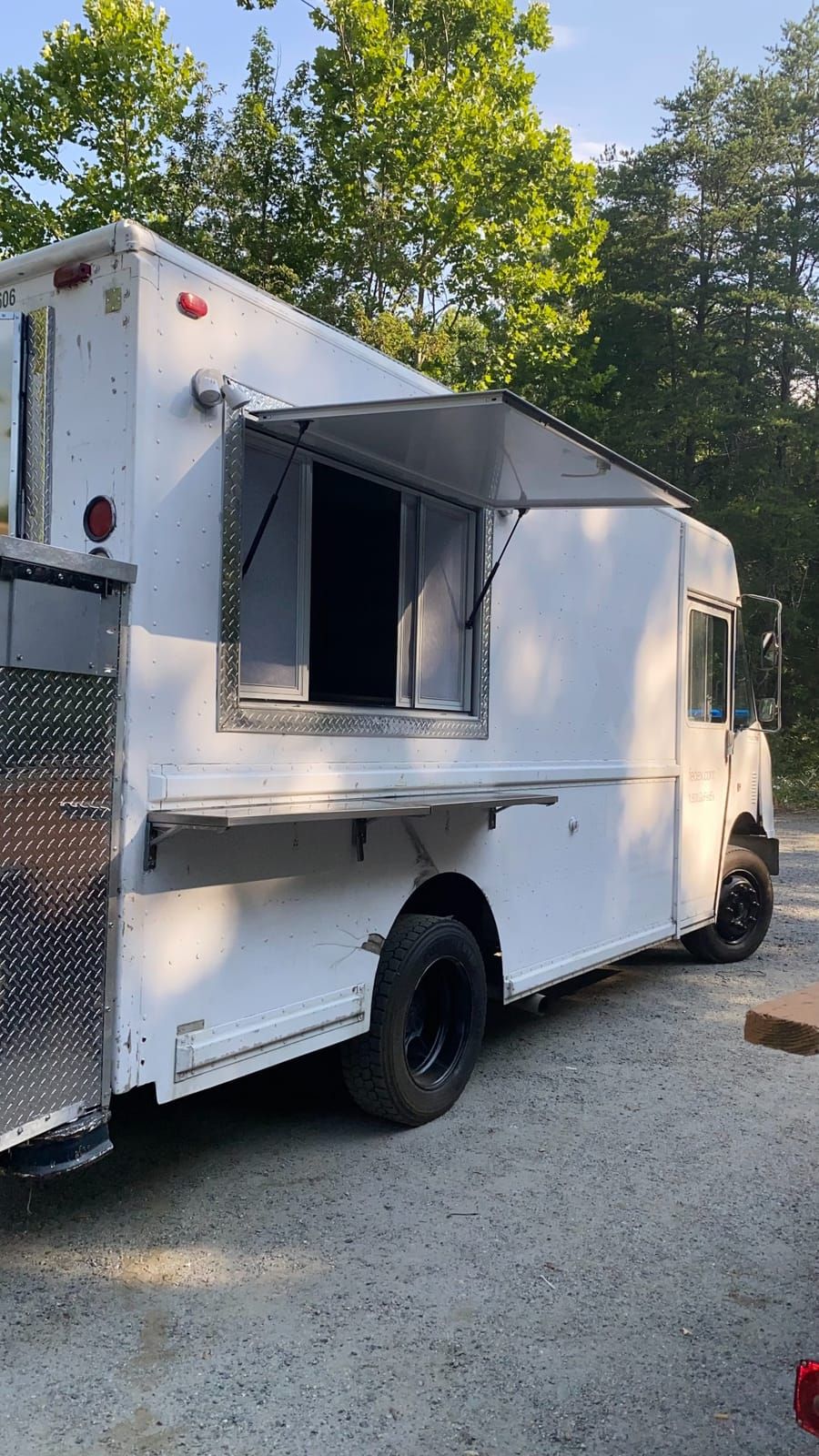 White Taco Truck — white truck with the service window open