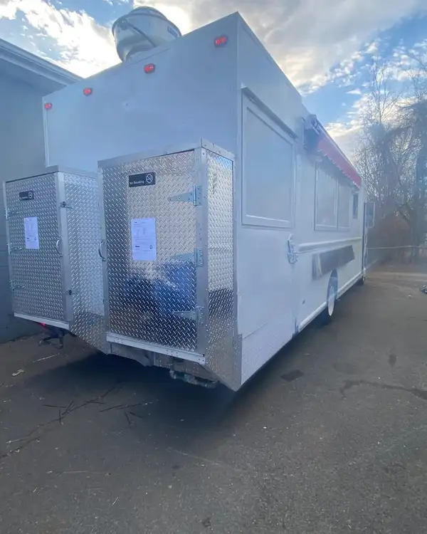 Double Kitchen — rear three-quarter view of the expanded body