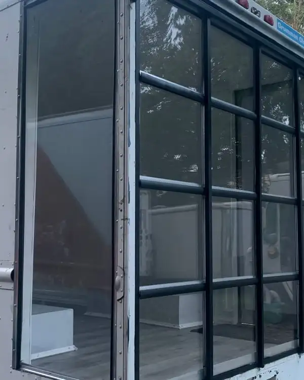 Mobile Boutique — side view of the glass storefront
