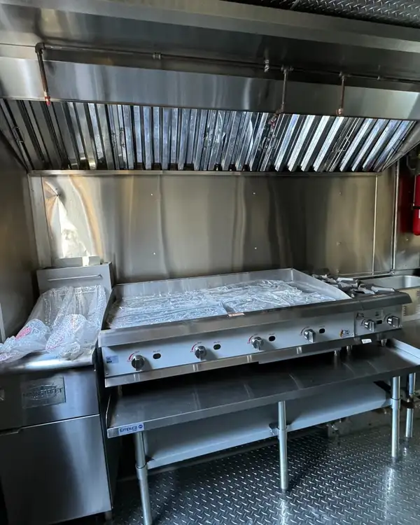 Taco Truck — griddle under the hood, wide view