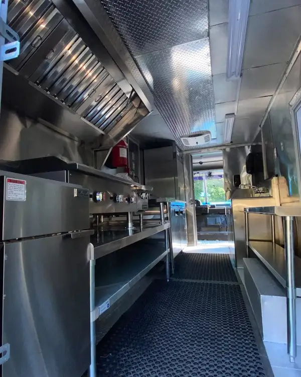 White Taco Truck — refrigeration and cook line toward the front