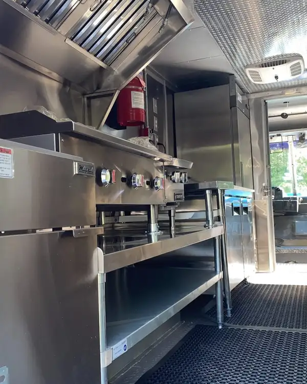 White Taco Truck — cook line seen from the rear