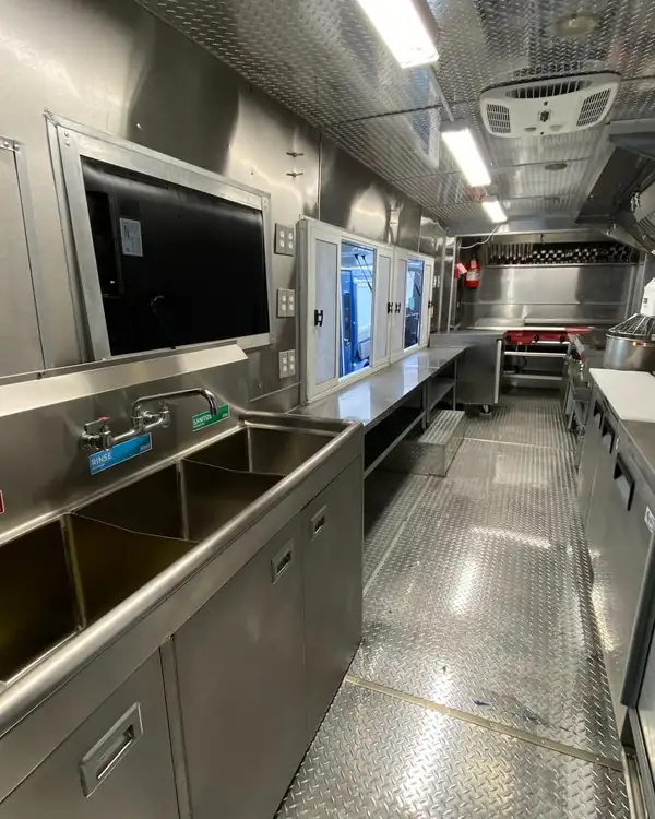 Double Kitchen — sinks, service windows and the long galley