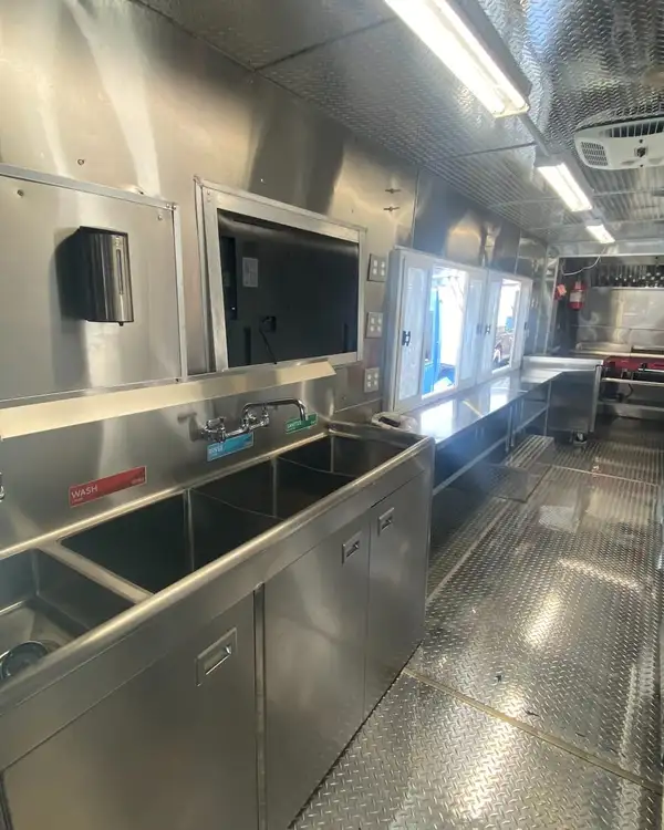 Double Kitchen — sinks and service windows along the galley