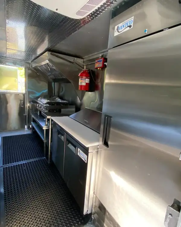 White Taco Truck — galley with refrigerator and prep counter
