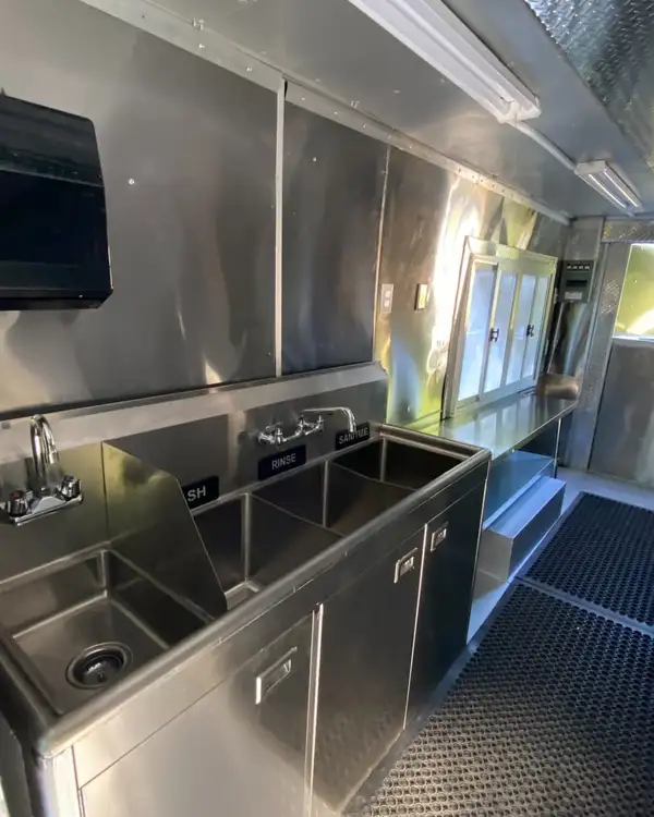 White Taco Truck — three-compartment sink and hand sink