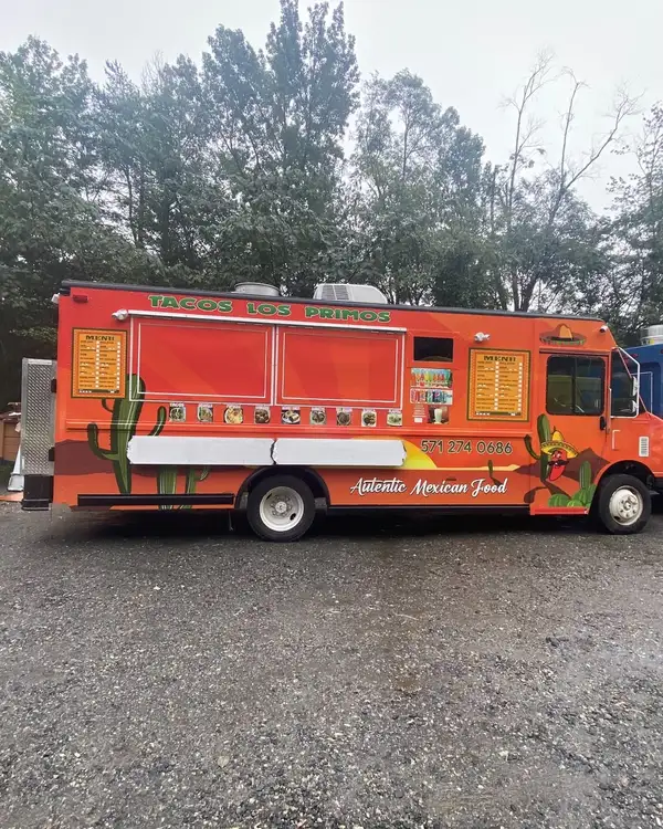 Tacos Los Primos — full side view of the wrapped truck