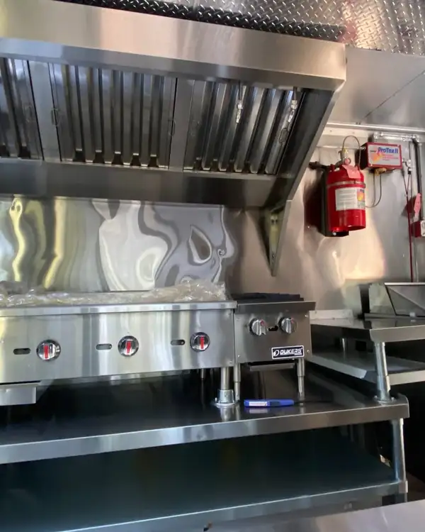 White Taco Truck — cook line with commercial hood