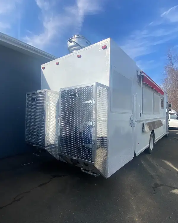 Double Kitchen — expanded truck seen from the rear