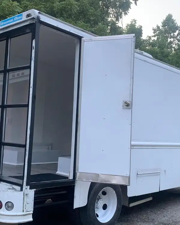 Mobile Boutique — storefront with the side door open