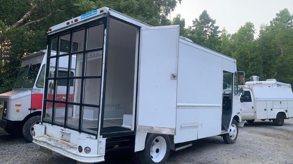 Mobile Boutique exterior with the glass storefront open