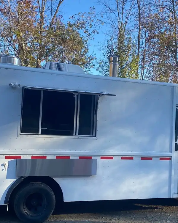 Pizza Truck — white truck, side view with the service window