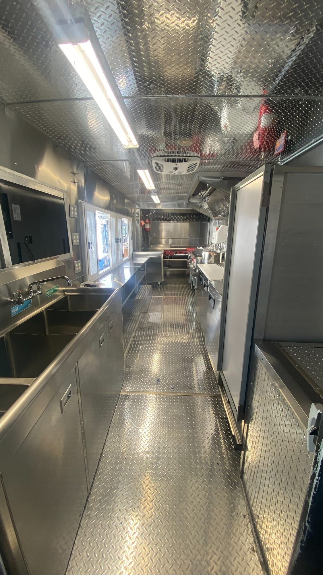 Long stainless galley of the finished Double Kitchen