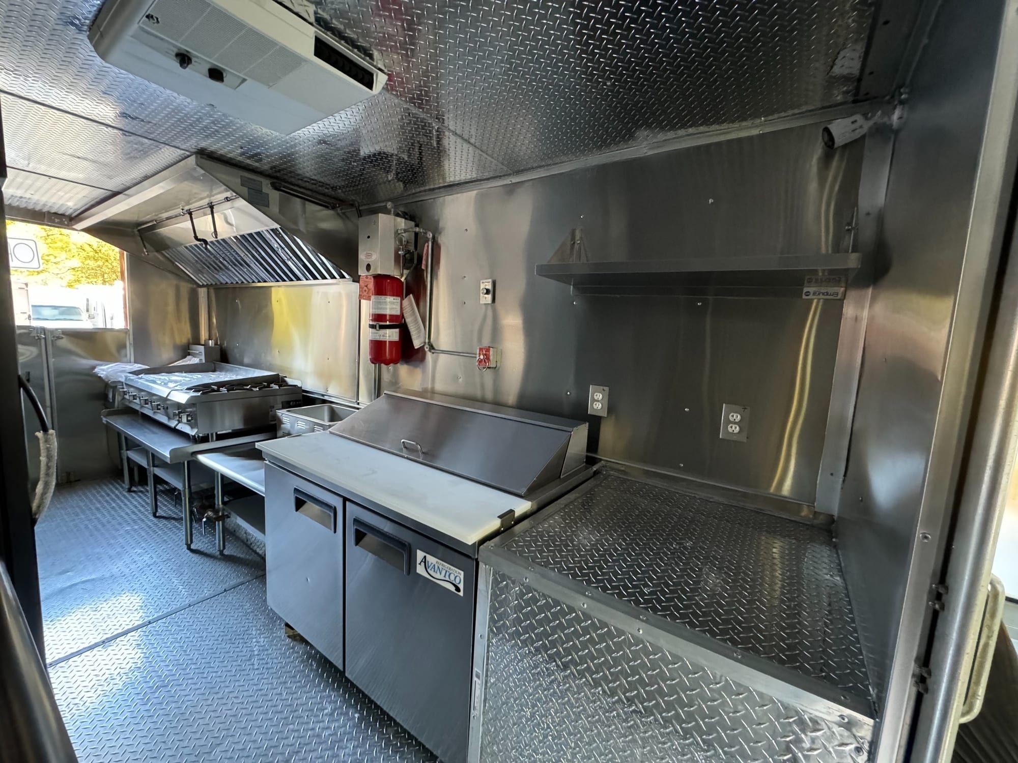 Refrigerated prep table and griddle in the taco truck