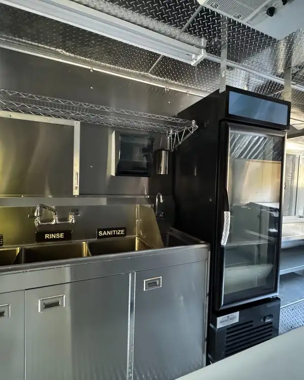 Taco Truck — wash, rinse and sanitize sinks with reach-in refrigerator