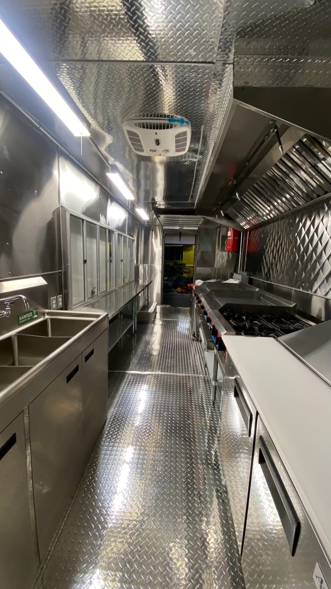 Sinks and full cook line inside the Mexican food truck