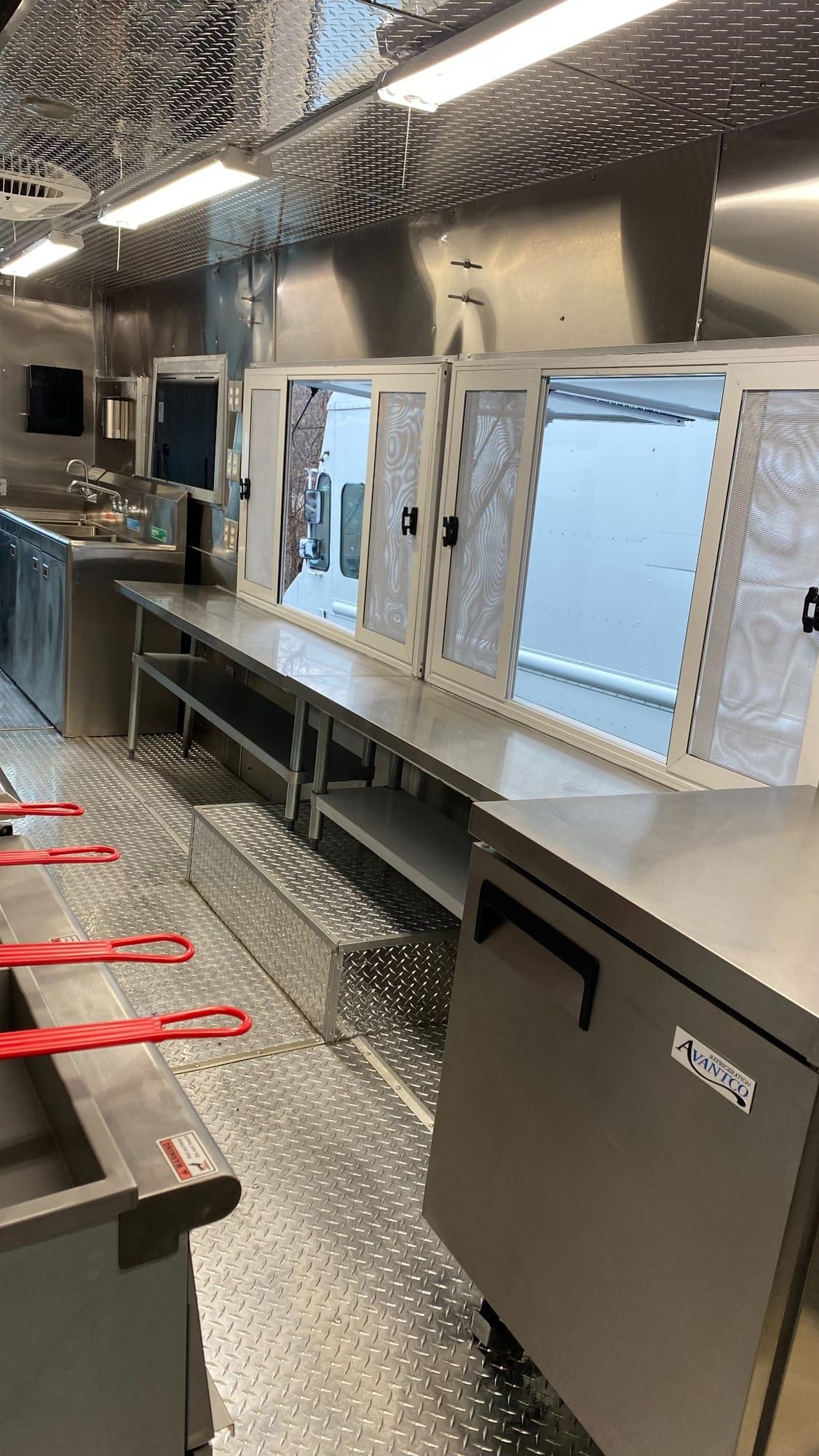 Service windows and work counter inside the Double Kitchen