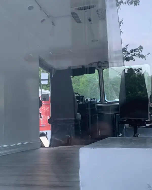 Mobile Boutique — interior seen through the glass storefront
