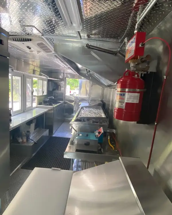 Tacos Los Primos — galley with fire suppression and service windows