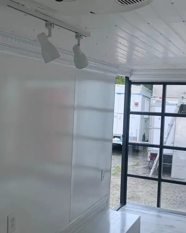 Mobile Boutique — retail floor with track lights
